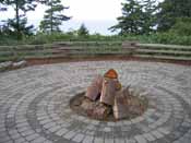 A fire pit using a circular brick design