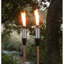 Two stainless steel tiki torches